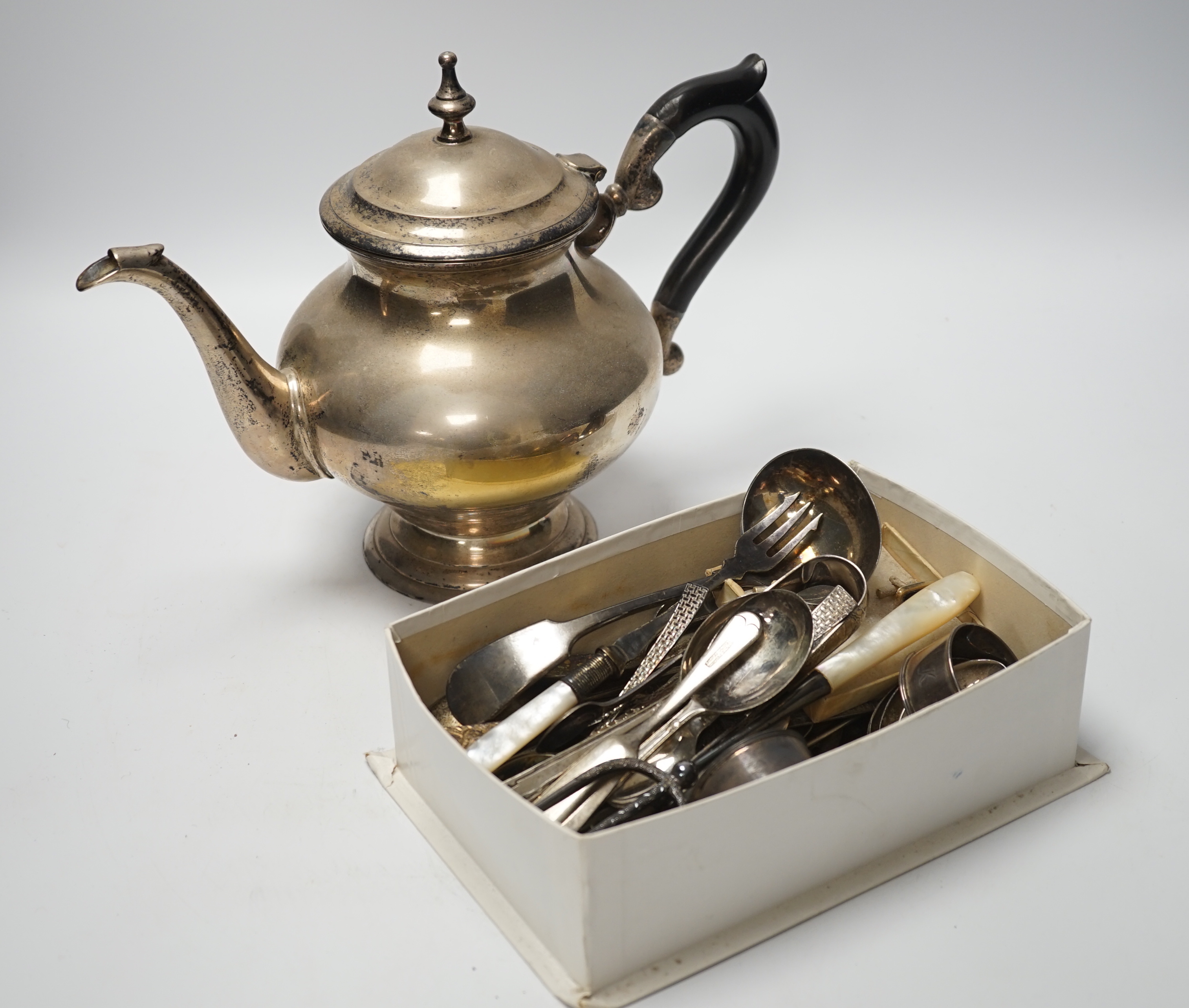 A large quantity of cutlery tea pot, trays etc